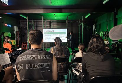 Coach presenting Nutrition Workshop at Habitat Gym to support long-term healthy habits